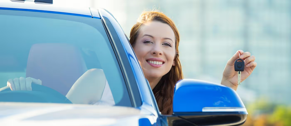 Woman-in-Newly-Purchased-Car